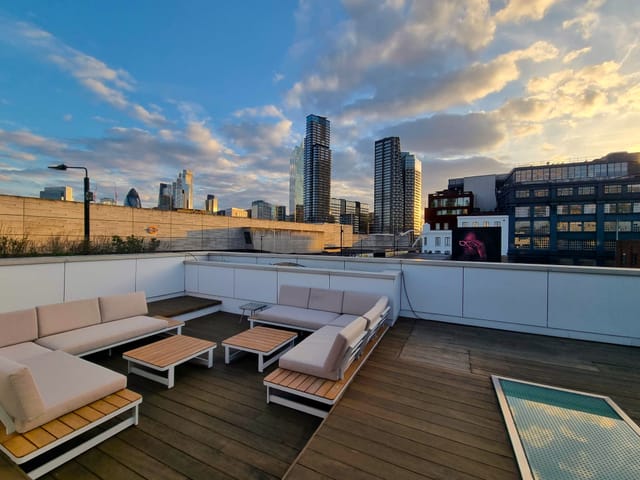 Stylish rooftop event space with skyline views at Sky Guild Gaming Centre.