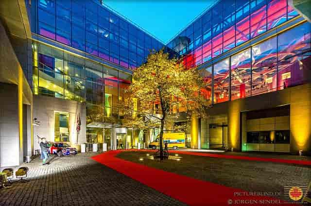 Vibrant ARTrium courtyard with red carpet, ideal for corporate events and galas.