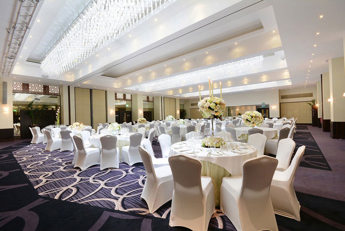 Grand Ballroom at Montcalm Marble Arch with elegant chandeliers, perfect for weddings and corporate events.
