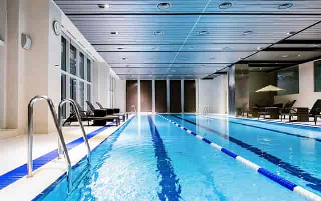 Modern indoor pool at LOTTE City Hotel Mapo, ideal for events and wellness retreats.