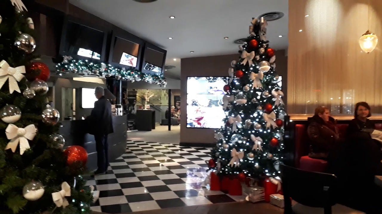 "Festive Christmas tree in Malmaison Manchester for holiday events and gatherings."