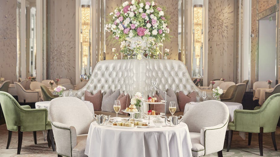 Elegant dining area in Palm Court, The Langham, London for upscale events and gatherings.