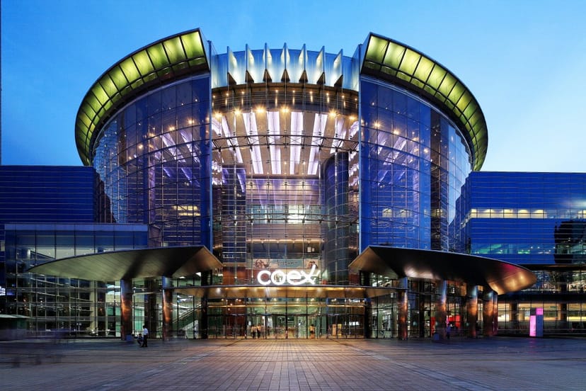 Modern COEX Exhibition Hall C with glass facade, ideal for conferences and events.
