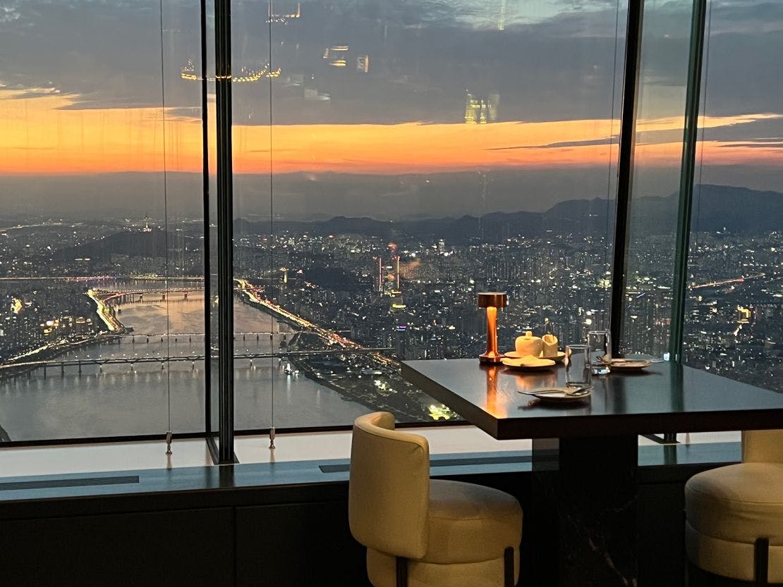 Revolving Restaurant in N Seoul Tower with sunset skyline views, ideal for corporate events.