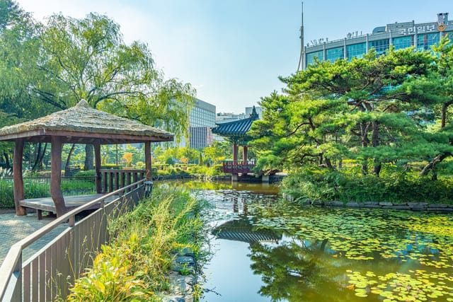 Serene Yeouido Park venue with tranquil pond, ideal for corporate retreats and wellness events.