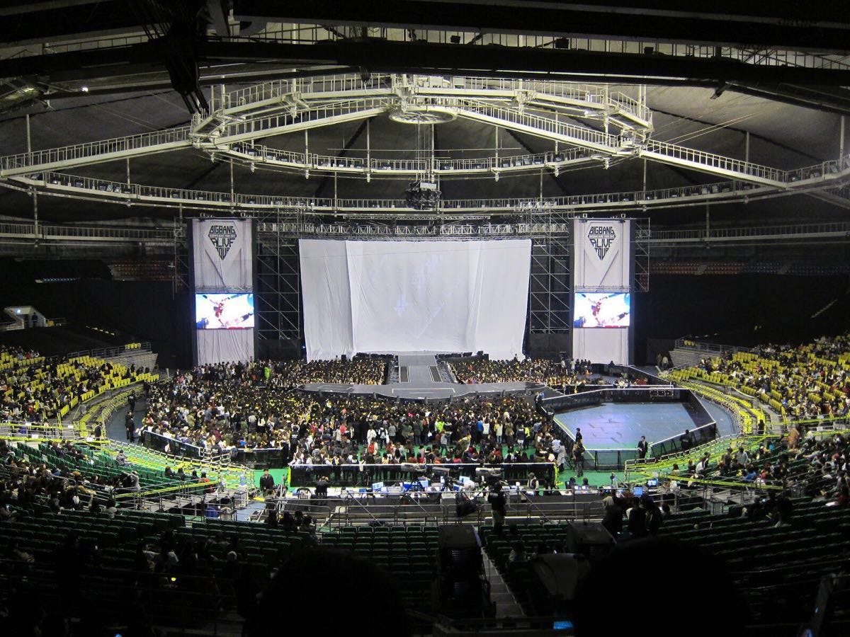 KSPO DOME event setup with central stage, ideal for concerts and presentations.