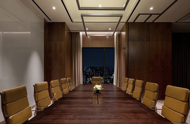 Modern conference room in Cintamani, Seoul with city view, ideal for meetings and events.