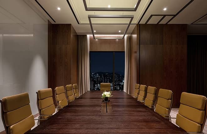 Modern conference room in Cintamani, Seoul with city view, ideal for meetings and events.