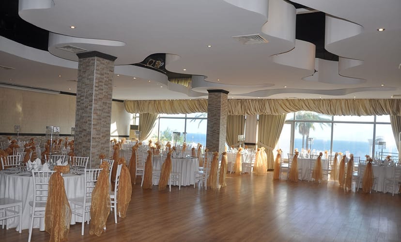 Elegant wedding chapel in Adonis Hall with ocean view, ideal for formal gatherings.