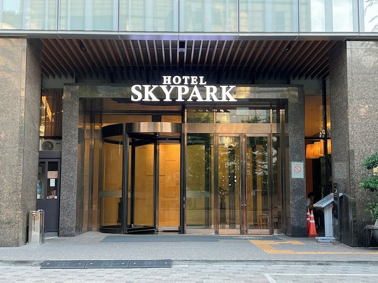 Rooftop terrace at Skypark Hotel, modern design ideal for corporate events and meetings.