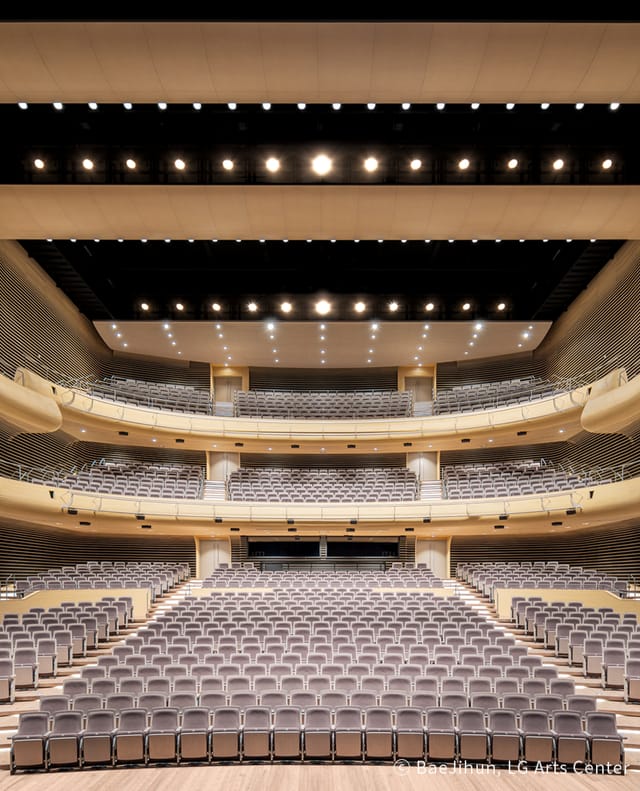 Modern concert hall in Seoul Arts Center with tiered seating for performances and conferences.
