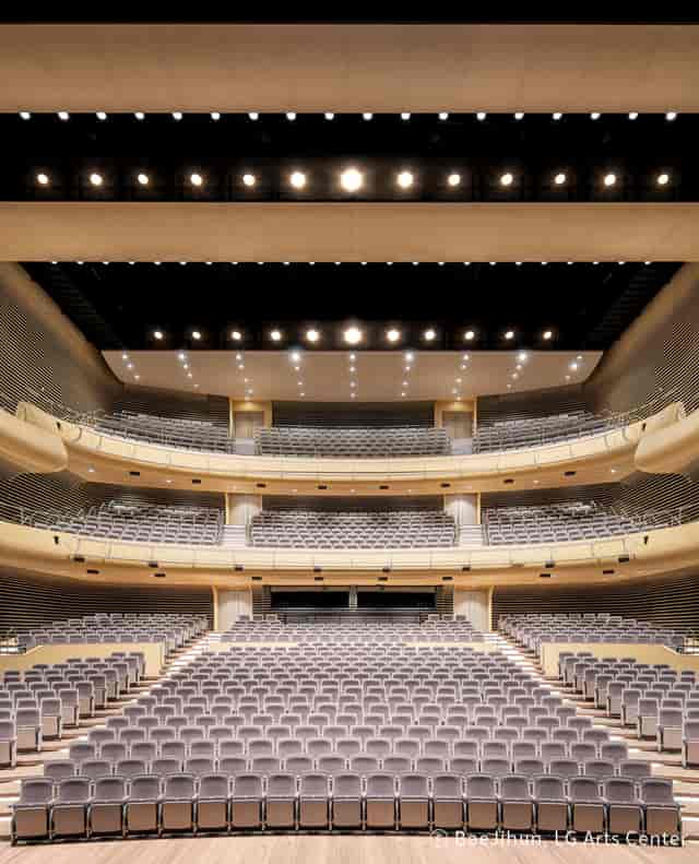 Modern auditorium with tiered seating at LG Arts Center Seoul for conferences and performances.