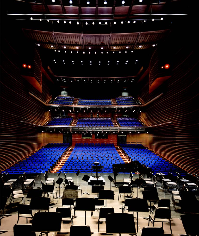 Modern auditorium with tiered blue seating at LG Arts Center Seoul for concerts and events.