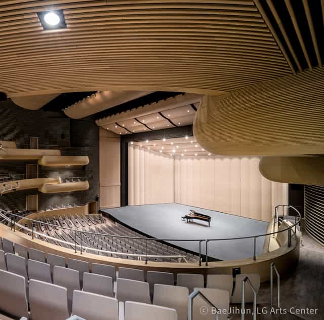 LG SIGNATURE Hall, modern auditorium with tiered seating for conferences and performances.