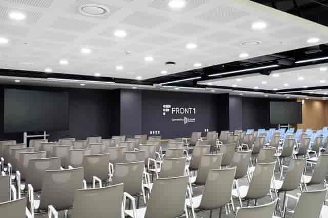 Modern event space with ergonomic chairs, ideal for conferences and corporate meetings.