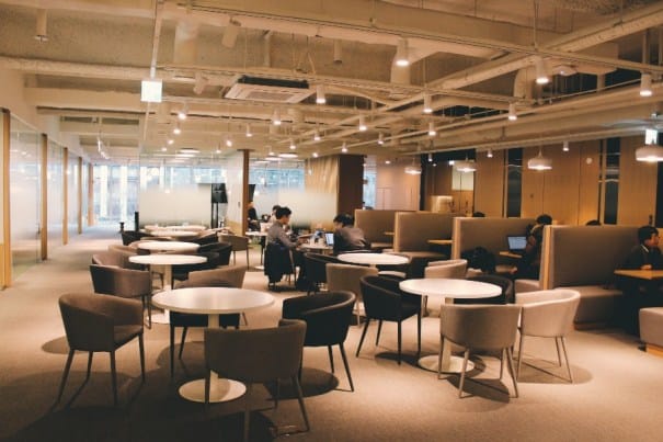 Modern co-working space with natural light, ideal for meetings and networking events.