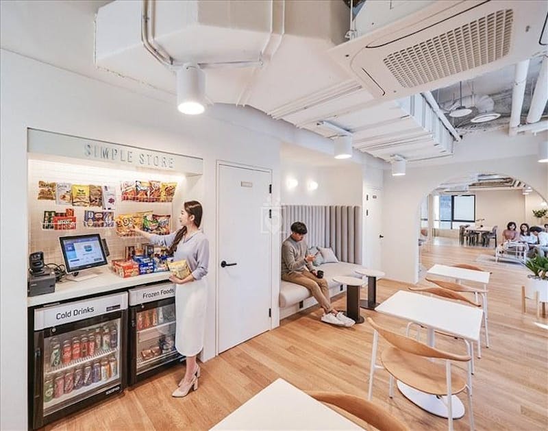 Sub Lounge in Fastfive: modern break area with snack station for events and meetings.