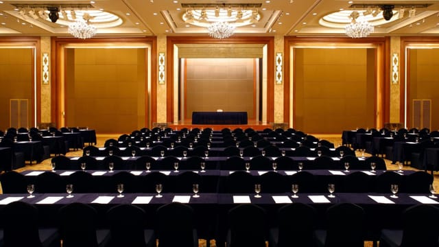Conference room with elegant decor, ready for corporate seminar or event.