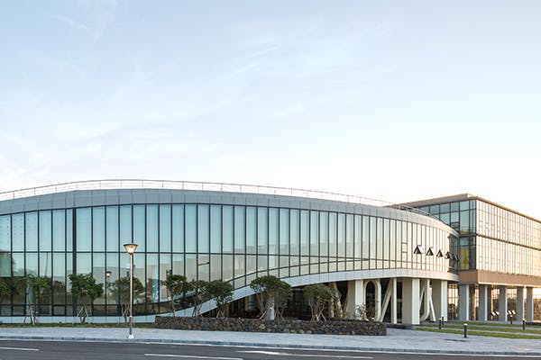 Modern event venue with glass facade at Creative Economy Innovation Center.