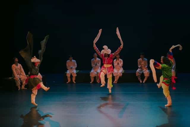 Colorful dancers perform at Namsan Gugakdang, enhancing live entertainment experience.