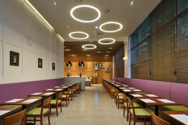 Modern conference room with circular lighting for intimate meetings at Hotel Atrium Jongno.