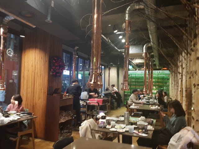 Vibrant Maple Tree House restaurant with modern design, ideal for events and gatherings.