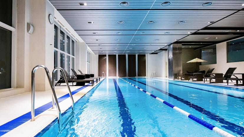 Lotte Hotel Seoul indoor pool, modern design for exclusive events and wellness retreats.