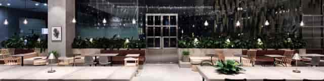 Modern event space at CAFE SAPOON SAPOON, perfect for meetings and gatherings.