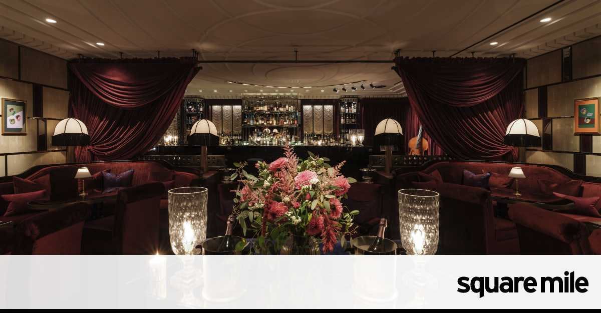 Elegant event space at Corinthia London with plush seating for upscale receptions.