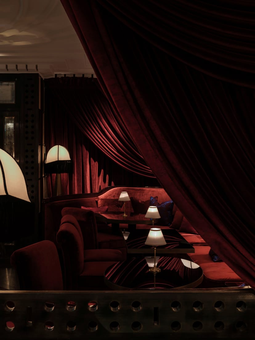 Elegant lounge at Corinthia London, featuring plush seating for private events.