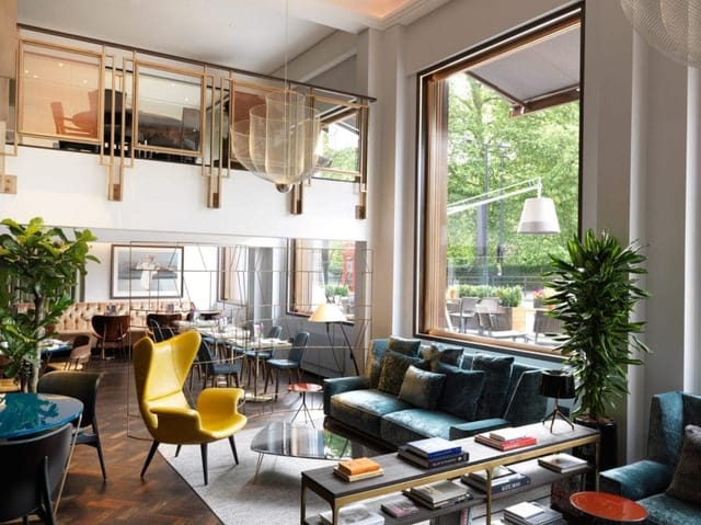 Green Park Meeting Room at The Athenaeum Hotel, modern event space with natural light.