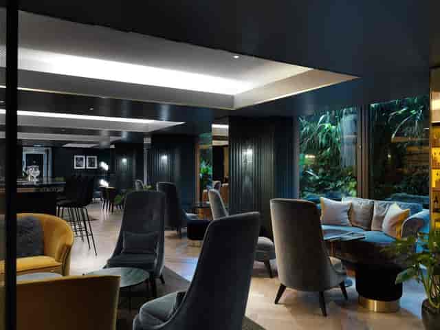 Sophisticated lounge at The Athenaeum Hotel for networking events and meetings.