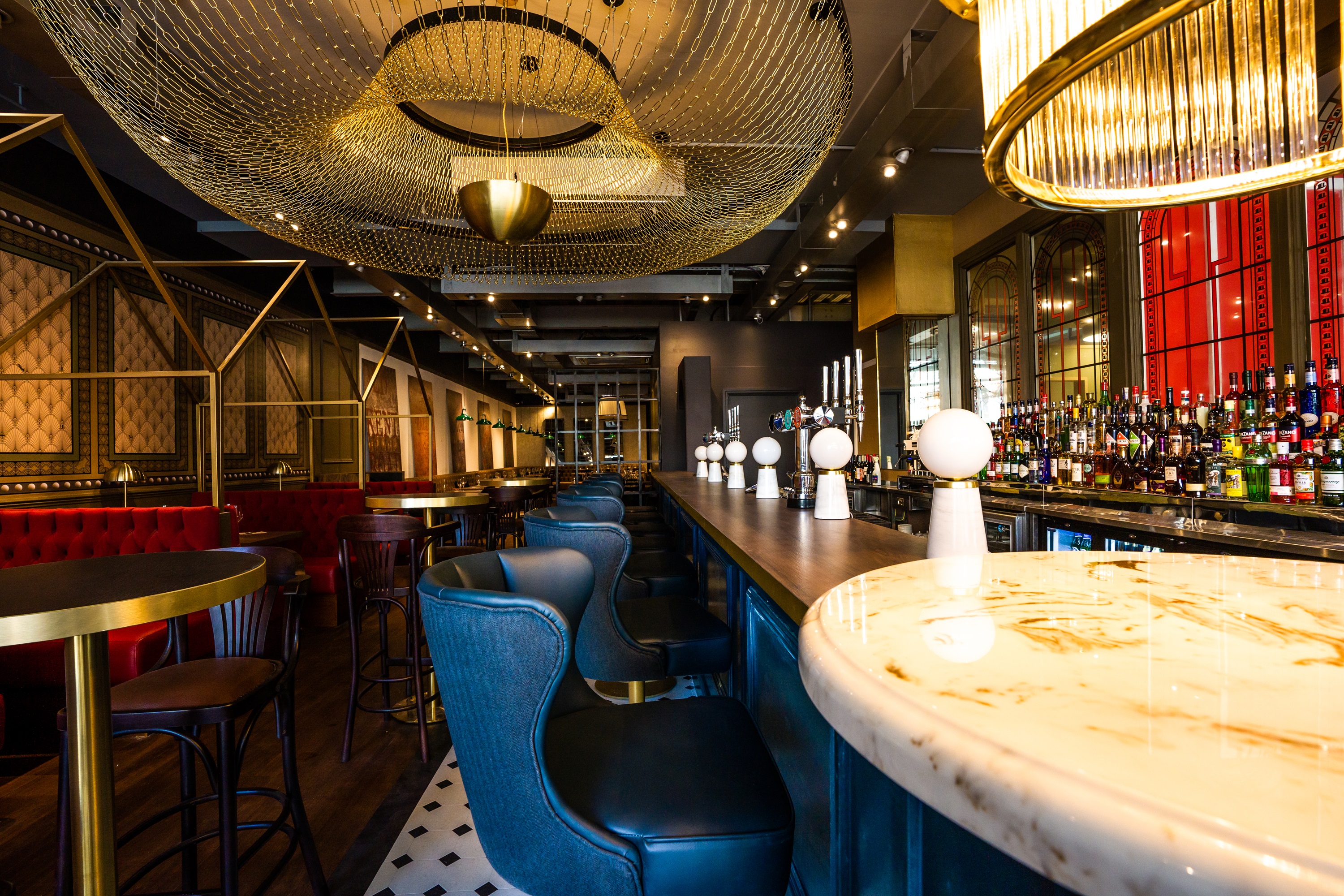 Stylish bar area at Top Hat Restaurant for upscale networking events and cocktail receptions. - Banner