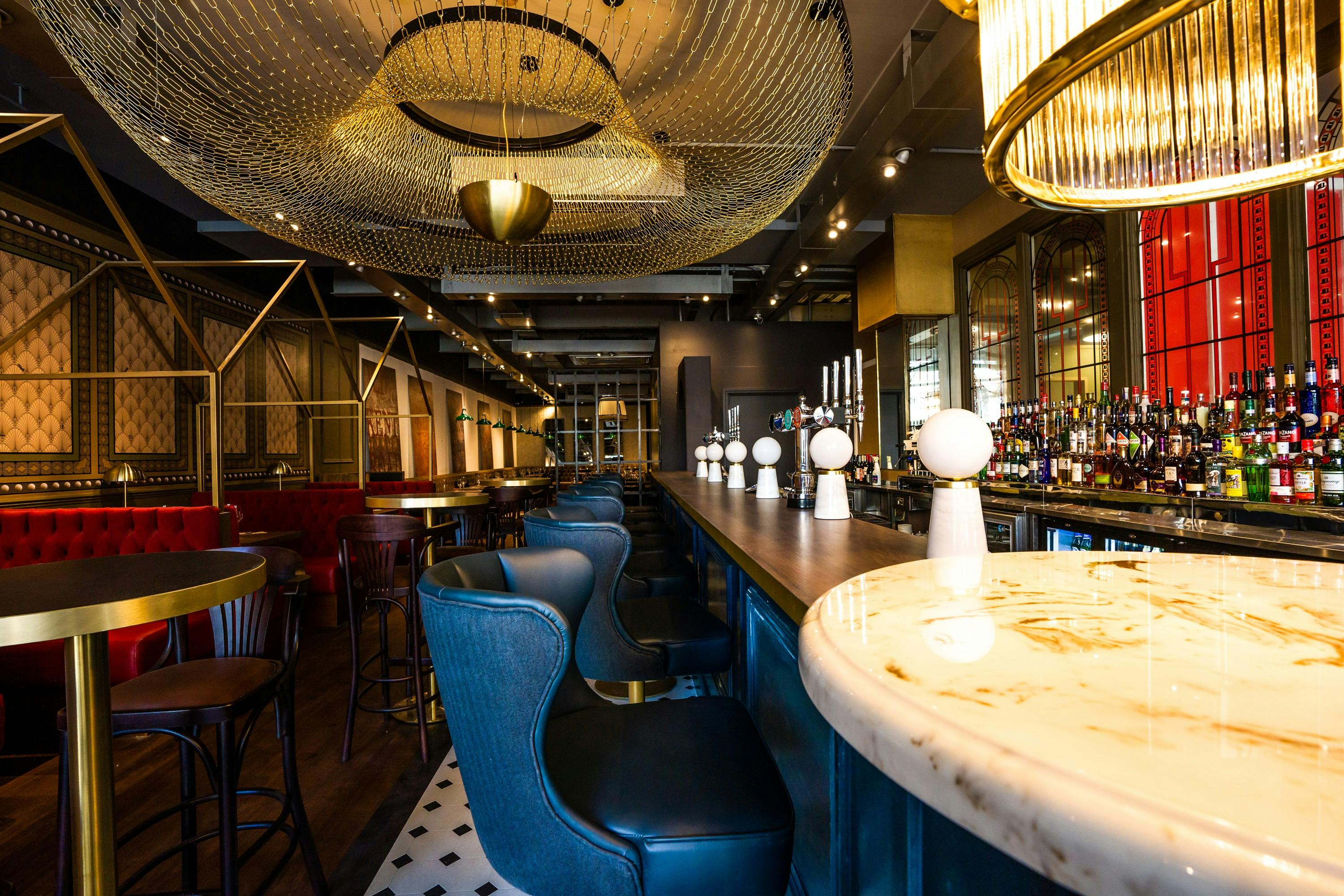 Semi-private hire at Top Hat Restaurant & Bar, featuring elegant decor for networking events.