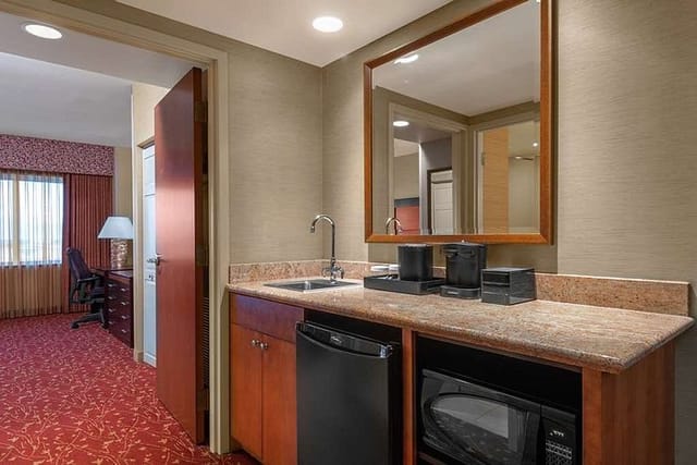 Conference room kitchenette at Embassy Suites Loveland, ideal for business events and meetings.