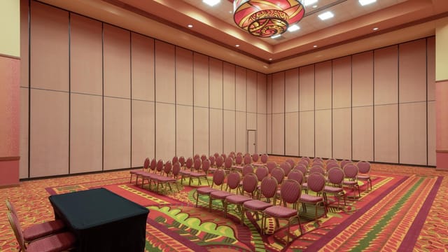 Conference room with flexible seating at Embassy Suites Loveland for events and workshops.