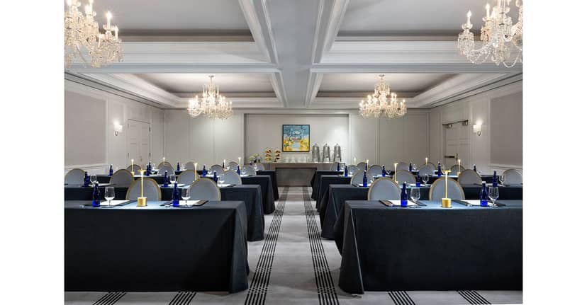 Private VIP Boardroom at The Langham, Boston with elegant chandeliers for corporate events.