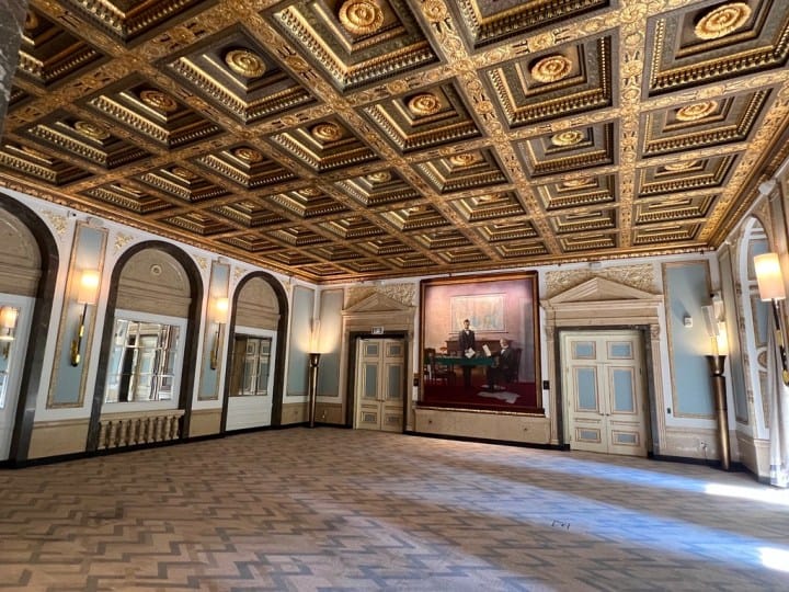 Elegant event space at The Langham, Boston with coffered ceiling for corporate receptions.