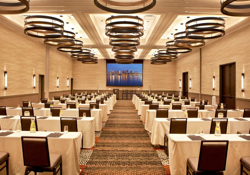 Commonwealth Boardroom at The Eliot Hotel, spacious layout for conferences and workshops.