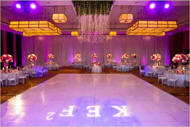 Rose Kennedy Ballroom with elegant tables and dance floor, perfect for weddings and events.