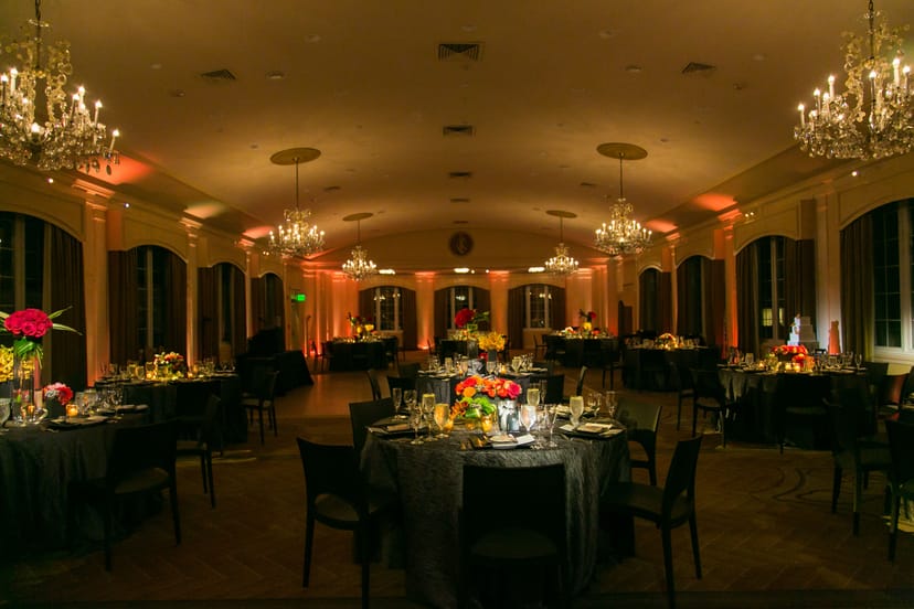 Elegant Rooftop Ballroom with floral centerpieces, perfect for formal dinners and galas.
