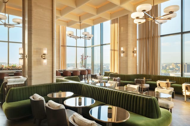 Private dining area in Raffles Boston, featuring plush seating for networking events.