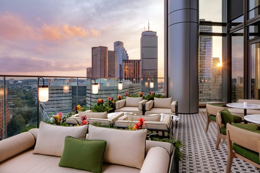 Rooftop private dining area at Raffles Boston, ideal for upscale events and gatherings.
