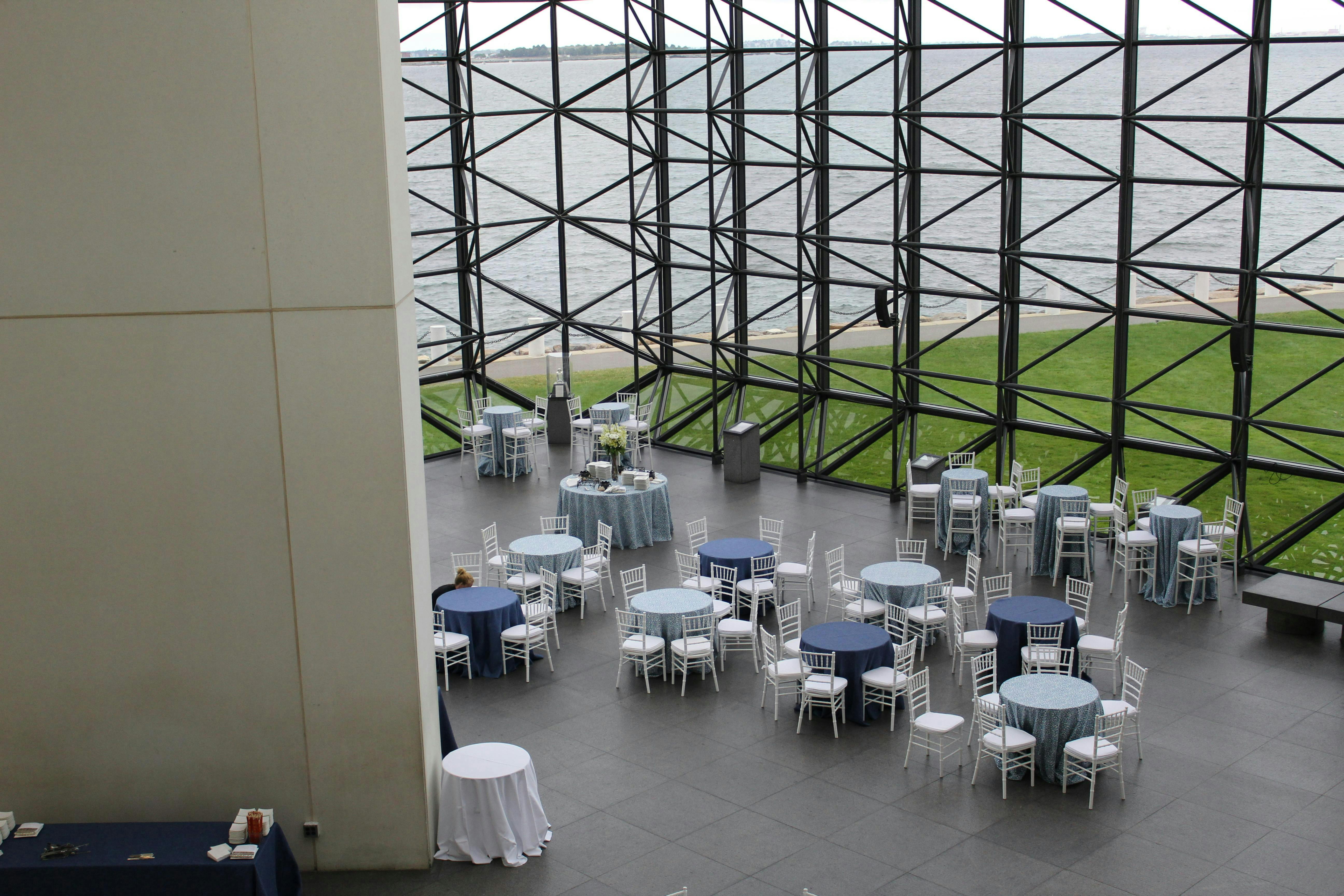 Museum Pavilion at JFK Library, spacious venue with glass walls for elegant receptions.