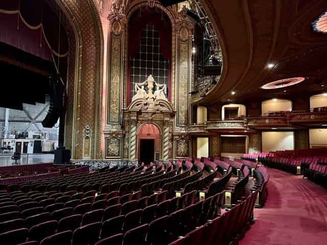 Wang Theatre Lower Lobby: ornate venue with plush seating for events and performances.