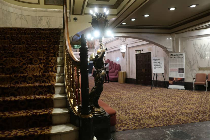 Elegant Orpheum Theatre lounge with grand staircase, ideal for upscale events and receptions.