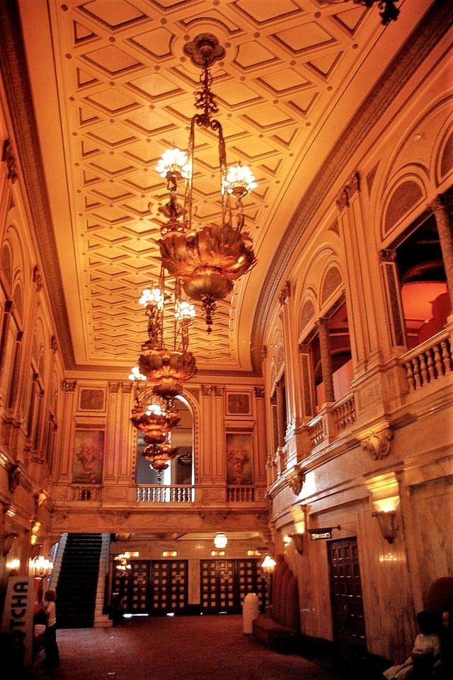Elegant Orpheum Theatre lounge with grand chandeliers, perfect for upscale events.