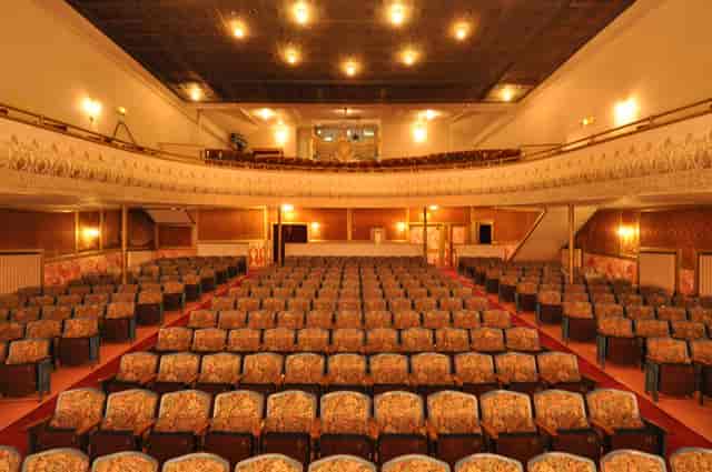 Larcom Theatre: elegant movie theater with tiered seating for conferences and performances.