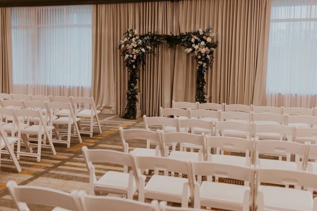 Serrano Ballroom at Kimpton Marlowe Hotel with floral arch for weddings and events.