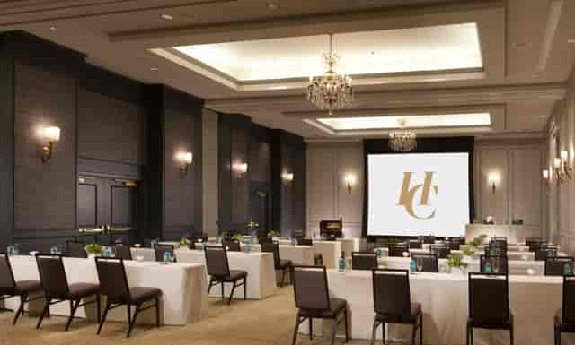 Olmsted Room at Hotel Commonwealth, elegant meeting space for corporate events.